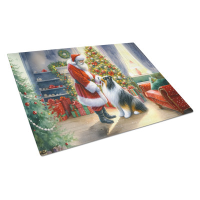 Collie and Santa Claus Glass Cutting Board
