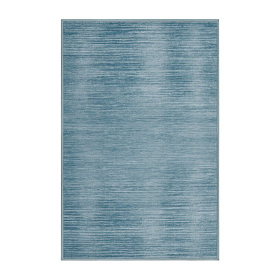Tapis bleu uni lavable à la machine