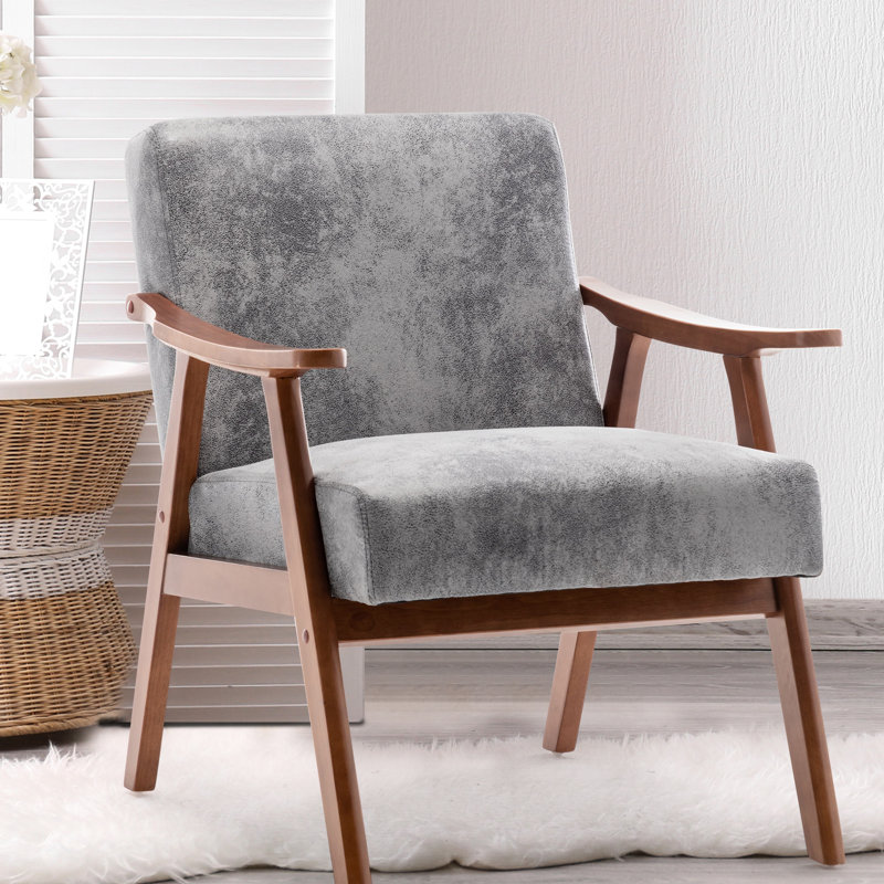 Chaise recouverte de velours avec une silhouette emblématique de style Mid-Century, structure en bois stable et revêtement doux