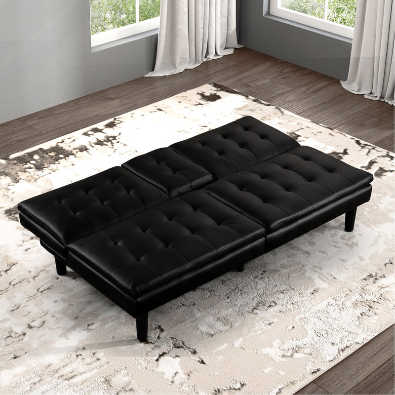 Futon noir de style contemporain qui se transforme en lit, coussins, coussins, table d'appoint et porte-gobelets, dossier de siège l 71,5 po x P 35,5 po, avec