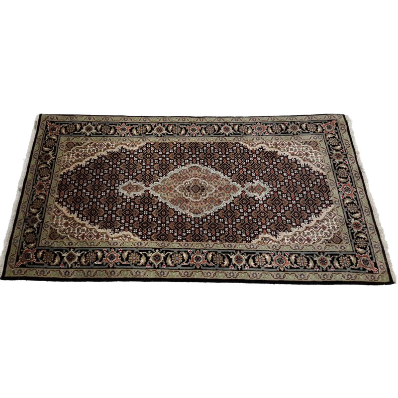 Nivethan Oriental Area Rug in Beige