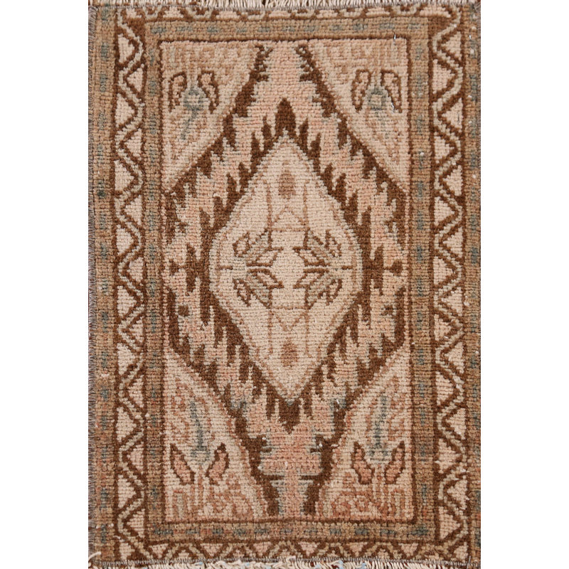 Tapis décoratif en laine aspect antique 1x2