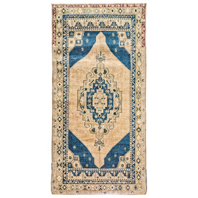 5x9 Ivory and Blue Turkish Tribal Rug