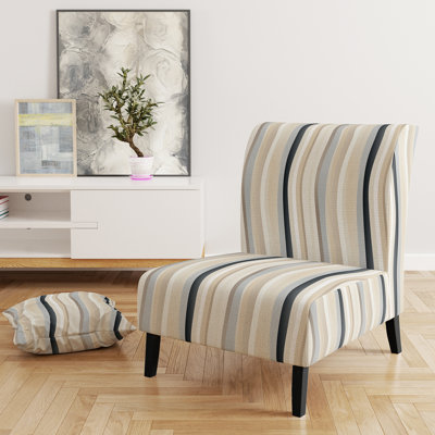Fauteuil crapaud moderne aux lignes équilibrées, revêtu de velours, avec motif rayé.