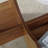 Oval Tempered Glass Coffee Table - 41.3"x23.6" Multi-Functional Design.Oval Tabletop.Walnut Wood Color Diagonal fan-shaped tray design Table Leg.Suitable for dining rooms, living rooms, offices.