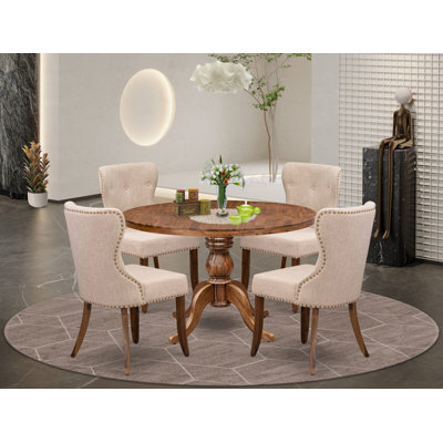 Cet ensemble de salle à manger 5 pièces comprend une table de cuisine ronde de 48 po avec piédestal et 4 chaises Parson en tissu de lin brun clair, noyer antique