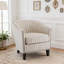 Fauteuil demi-tonneau rembourré à rayures