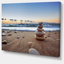 «Risa Stones Balance on Sandy Beach», photographie-1392765338-1392765375