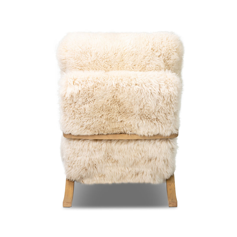 Tobin Upholstered Armchair, Champagne Mongolian Fur, Aged Smoked Oak