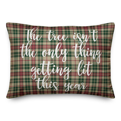  L'arbre n'est pas la seule chose à être éclairée cette année avec un coussin lombaire en tartan