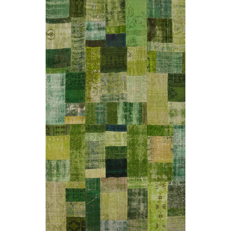Tapis vert en laine patiné 7 x 10