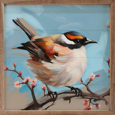 Oiseau sur une branche maigre