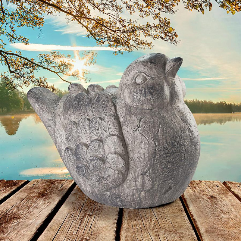 Statue d'oiseau pâle à plumes fines