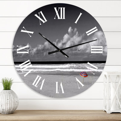 Monochrome Coastline Under Cloudy Sky - Lake House wall clock
