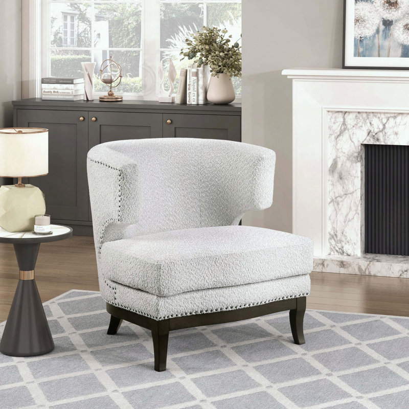 Fauteuil d'appoint tonneau gris - garniture cloutée - pieds en bois massif