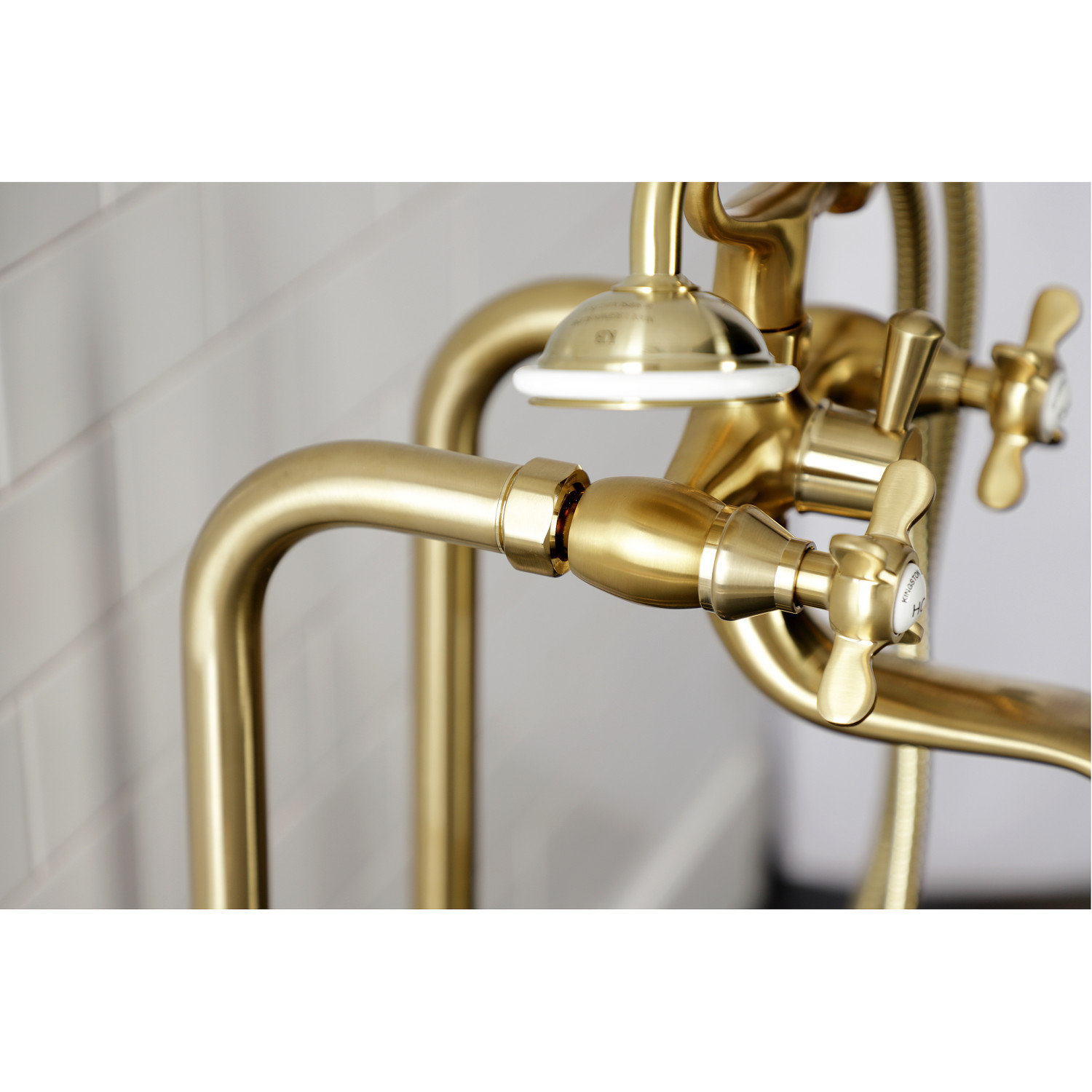 Kingston Brass Essex Three-Handle 2-Hole Freestanding Clawfoot Tub Faucet Package with Supply Line and Stop Valve
