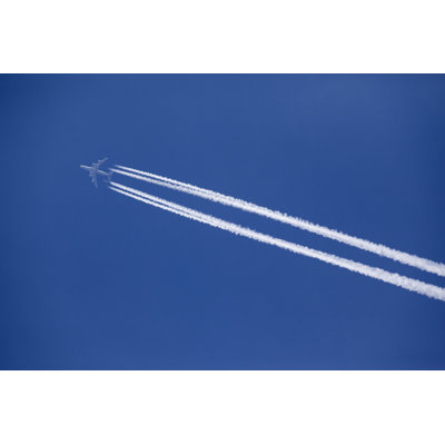 Four Engine Contrail - Wrapped Canvas Print