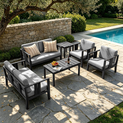 Ensemble de patio extérieur en teck Junco pour six personnes avec coussins et deux tables