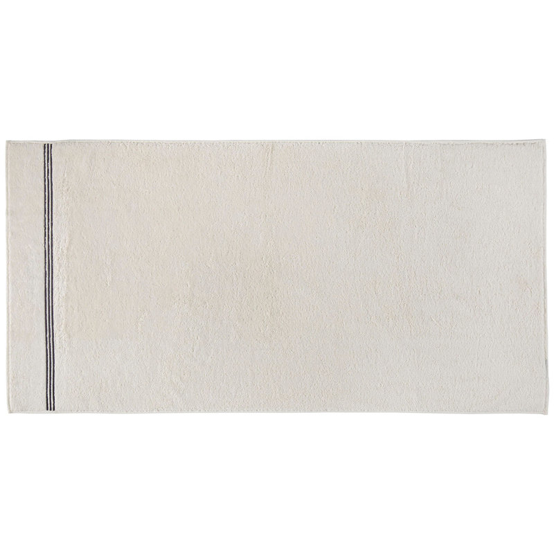 Serviette de bain 100% coton Stalcup, Crème / bleu foncé