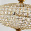 Lustre globe en cristal 5 lumières or antique