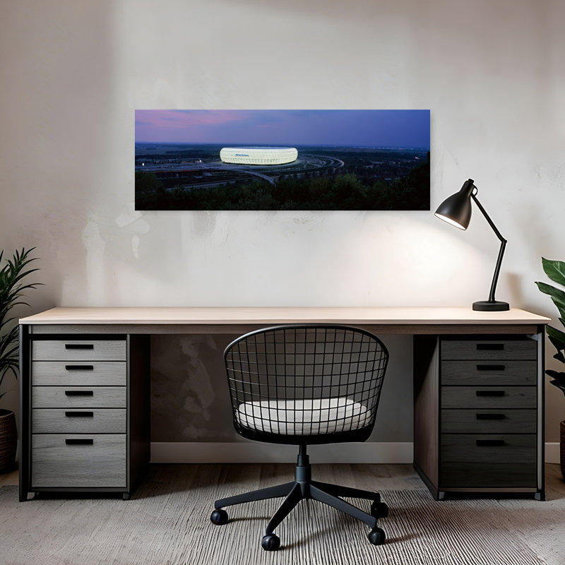 Soccer Stadium Lit Up At Nigh Allianz Arena Munich Bavaria Germany by PanoramicImageWorld - Wrapped Canvas Panoramic Print