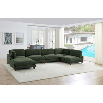 Canapé modulaire à large assise en velours côtelé