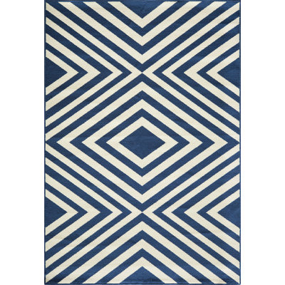 Tapis intérieur / extérieur bleu marine / ivoire Turnbow
