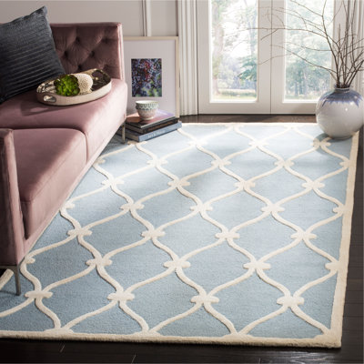Tapis blanc / bleu en laine à motif géométrique Cannen