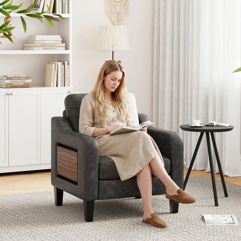 Fauteuil large en similicuir rembourré, Noir