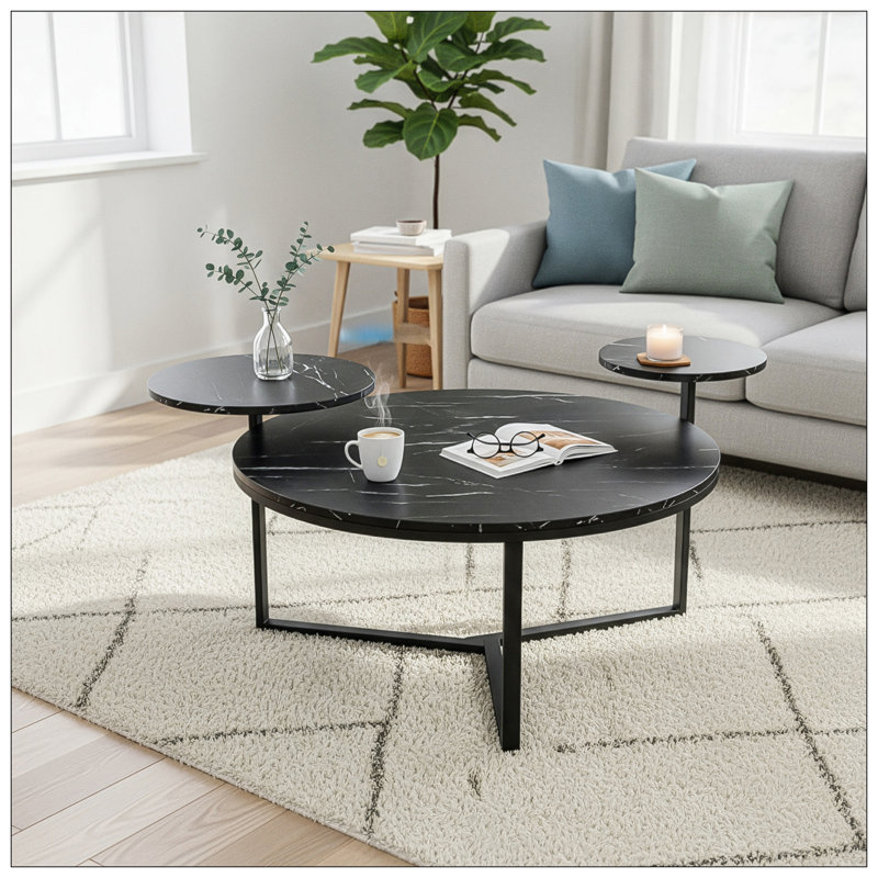 Table basse moderne avec deux tablettes, surfaces en faux marbre noir, base inspirée d'un trépied, bords de table arrondis