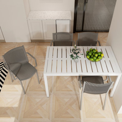 55 Inch White Long Table With 4Pcs Warm Grey Stackable Armchairs - In All Climates, Easy To Clean Surface, Ergonomic Support Design Modern All-Weather Performance, Simple Assembly, Contour