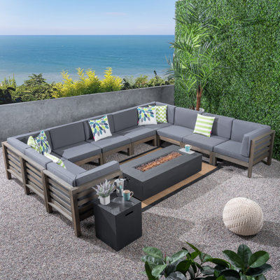 Ajanai Outdoor 12 Piece Sectional Seating Group with Cushions by Wade Logan