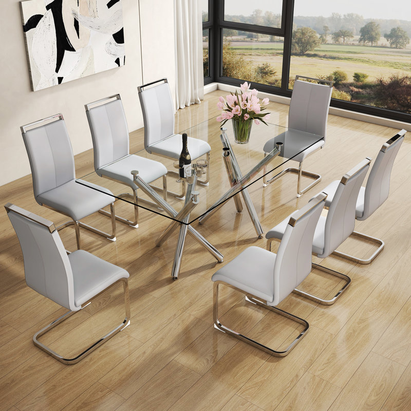 Daarina Modern Dining Table Set, Large Rectangular Glass Table with Silver X-Base and Faux Leather Cantilever Chairs, 9
