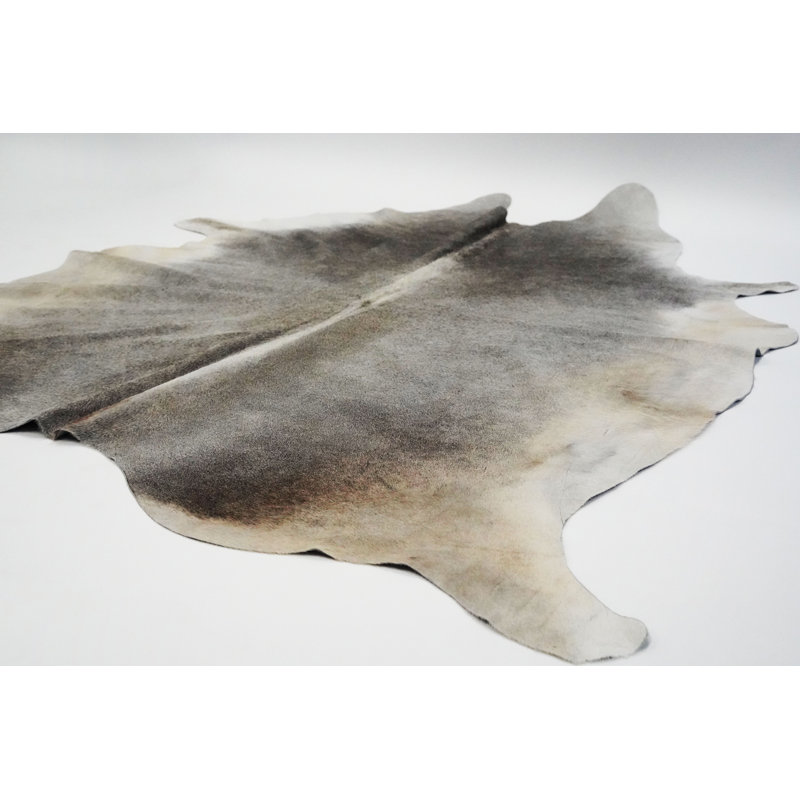 Tapis gris en peau de vache mélangée à imprimé animal