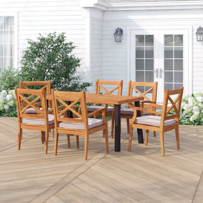 Hannes 6 - Person Acacia and Teak Solid Wood Patio Dining Set Rectangular Table with Cushions Included