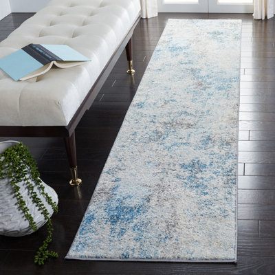 Tapis ivoire / bleu Eslick