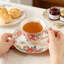 Service à thé en porcelaine tendre 15 pièces avec peinture florale élégante, comprenant théière, tasses, soucoupes, sucrier, pot à crème et cuillères pour le thé ou le café