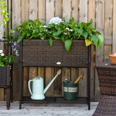 28 Inch Elevated PE Rattan Planter Box with Bottom Tool Storage
