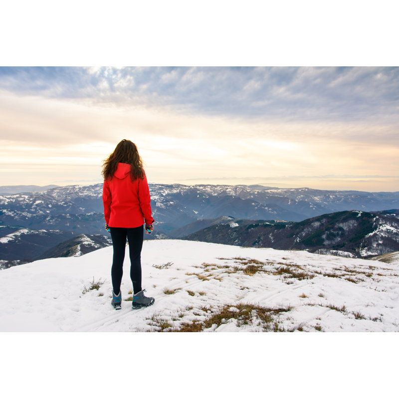 Female Hiker On Snow by Creative-Family - Wrapped Canvas Print, 30cm H x 46cm W
