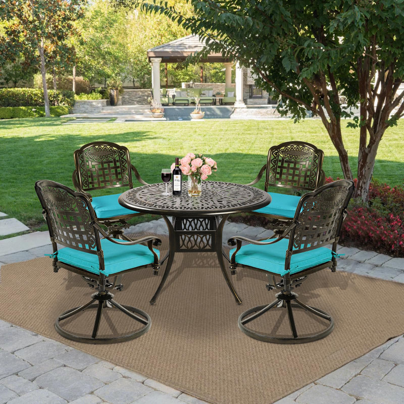 4 - Person Patio Dining Set with Round Table , Cushions Included, Ocean Blue