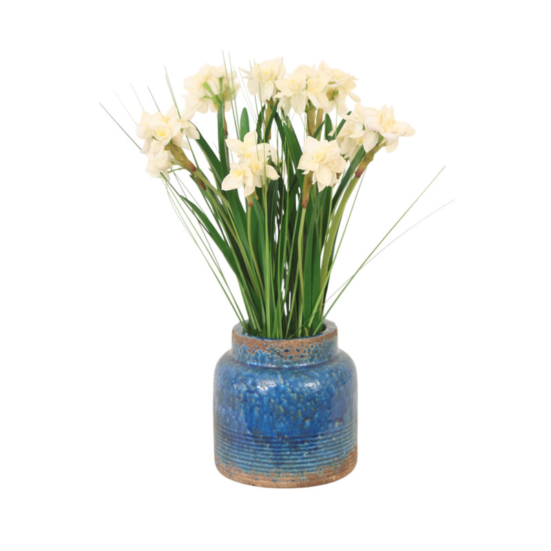 Pots de papier dans un pot bleu vieilli