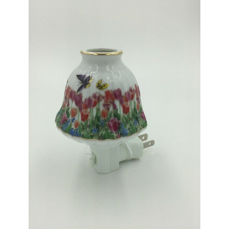 Nalayiah papillons sur un champ de fleurs veilleuse