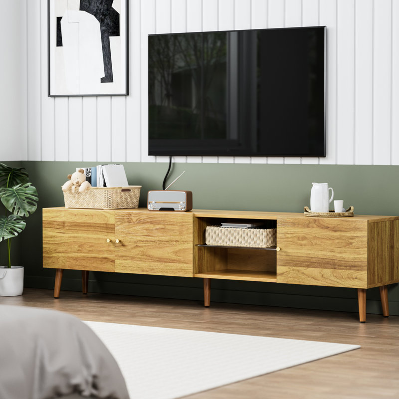 Le meuble télé 70 po avec rangement de style Mid-Century améliore le décor de la chambre à coucher du salon. Fabrication moderne, pieds en pin