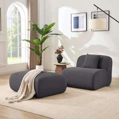 One Dark Gray Armless Chair And One Dark Gray Ottoman