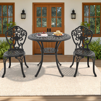 All-weather cast aluminum patio set - premium outdoor dining furniture with table & chairs in black frame