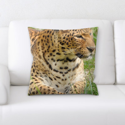 Coussin en jeté leopard