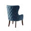 Fauteuil d'appoint à dossier capitonné
