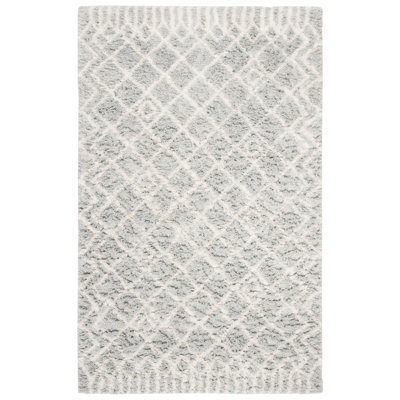 Tapis bleu / ivoire en laine et coton touffeté à la main Derron