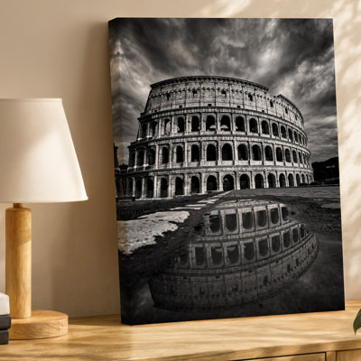Canvas A Dramatic Black And White Photograph Of The Colosseum In Wall Art Rome Showcasing Its Grand Architecture Amidst An Ominous Sky Canvas Wall Art