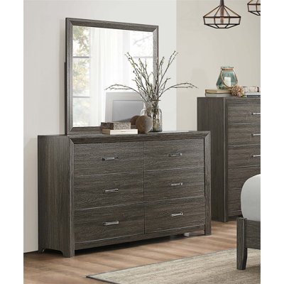 Commode moderne à 6 tiroirs avec poignées en chrome, finition gris foncé pour un rangement élégant dans la chambre à coucher